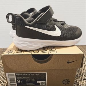 Brand new Nike Revolution  size 8 C black, white